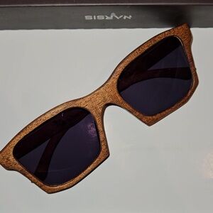 Handmade sunglasses with walnut tree frames